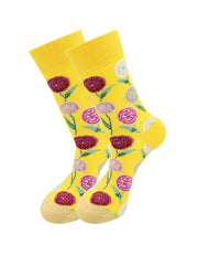 Pair of yellow crew socks with a floral pattern of chrysanthemums in purple, pink, and white.